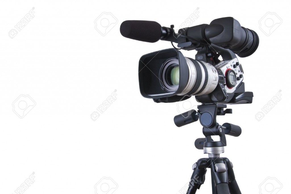 10296355-Professional-video-camera-set-on-a-tripod-with-copy-space-with-excellent-clipping-path--Stock-Photo